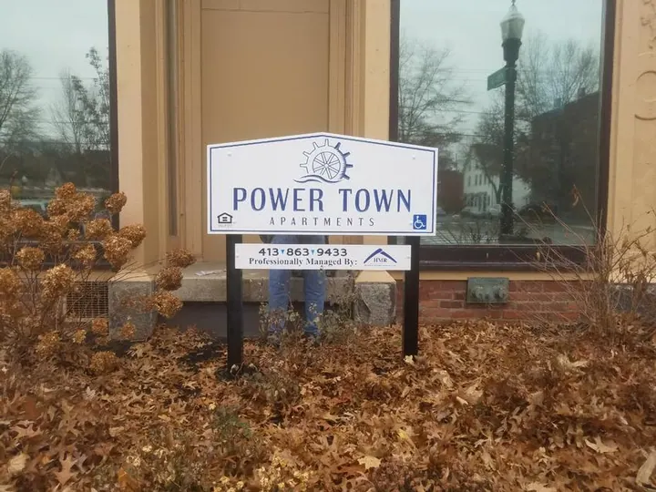 Carved letter sign POWERTOWN Apartments — Carved & Gold Leaf Signs by Hale Custom Signs