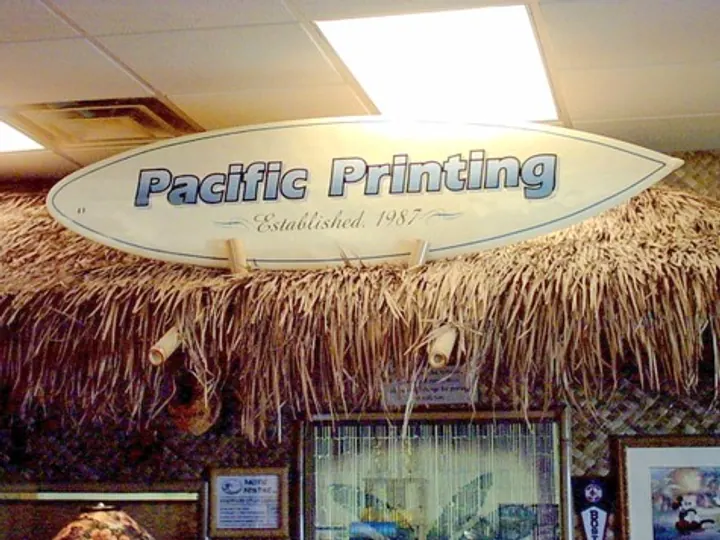 Pacific Printing Surfboard with airbrush graphic — Specialty Signage by Hale Custom Signs