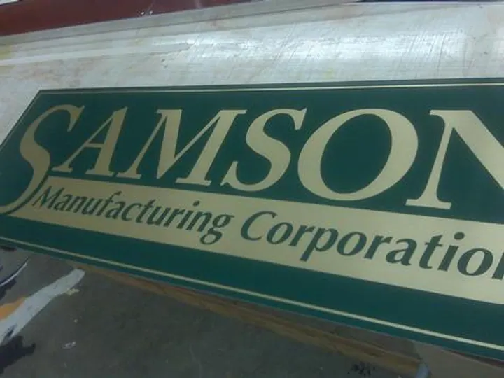 Brushed brass vinyl — Trade Show by Hale Custom Signs