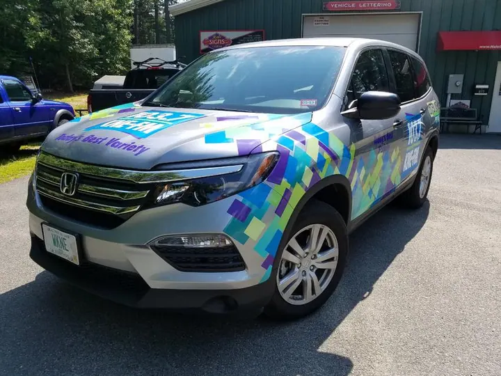 WKNE Station vehicle wrap — Corporate Clients by Hale Custom Signs