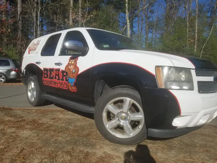 Bear Country and The Outlaw Radio Station partial wrap — Vehicle Graphics by Hale Custom Signs