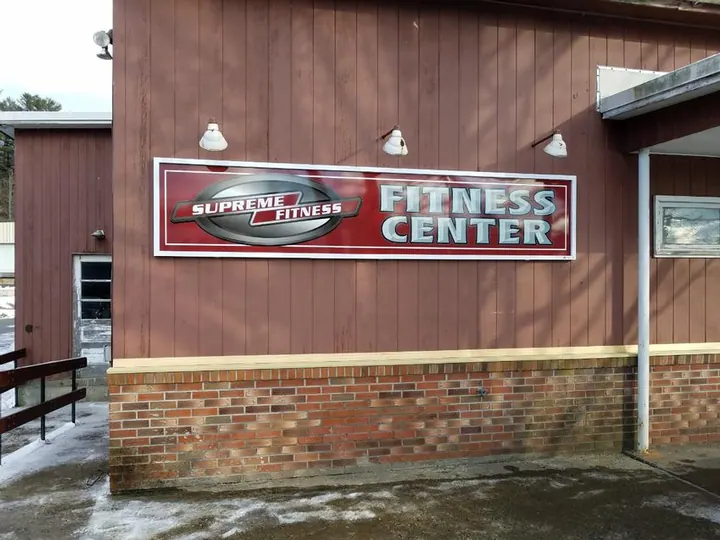 Supreme Fitness aluminum wall sign with frame moldings — Wall & Building Signs by Hale Custom Signs